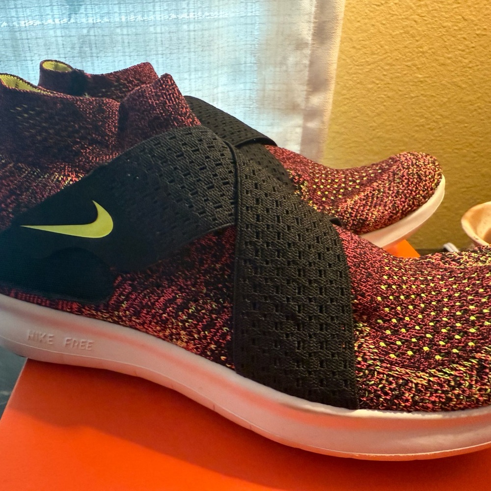Nike Flyknit Sneakers with Black and Yellow Accents